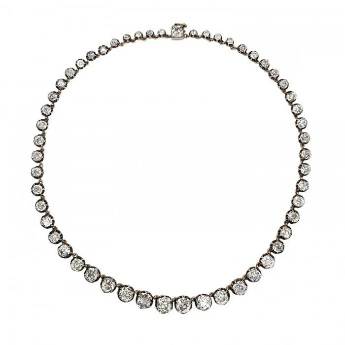 Victorian Antique 40cts Old Cut Diamond Line Riviere Necklace, 54 old-cut diamonds totalling 40 carats in silver-upon-gold crown claw settings. Late 19th century Circa 1880