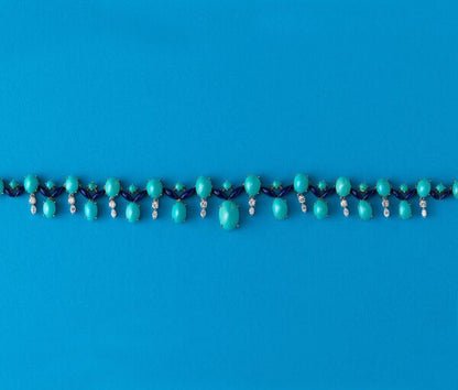 Vintage Turquoise, Diamond and Enamel Fringe Necklace; set with oval and round cabochon cut turquoises, dark blue enamel and 1.55cts brilliant cut diamonds, in 18ct gold, Circa 1960