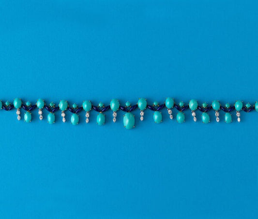 Vintage Turquoise, Diamond and Enamel Fringe Necklace; set with oval and round cabochon cut turquoises, dark blue enamel and 1.55cts brilliant cut diamonds, in 18ct gold, Circa 1960