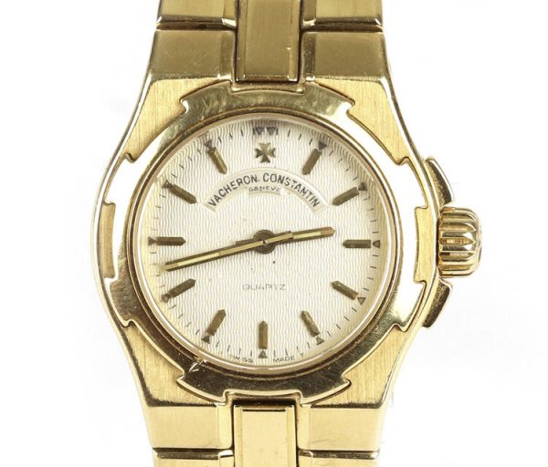 Vacheron Constantin Overseas Ladies 18ct Yellow Gold 24mm Quartz Bracelet Watch; Ref 16050/423J, silver dial with gold baton hour markers, 18ct yellow gold strap with a double deployment strap and additional safety clip