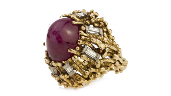 Vintage 4ct Cabochon Burmese Ruby, Diamond and 18ct Gold Cocktail Ring; stunning natural Burmese 4 carat ruby with baguette diamond accents. Circa 1950-1970