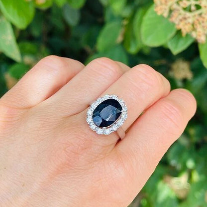 Vintage 1970s oval blue sapphire diamond cluster ring