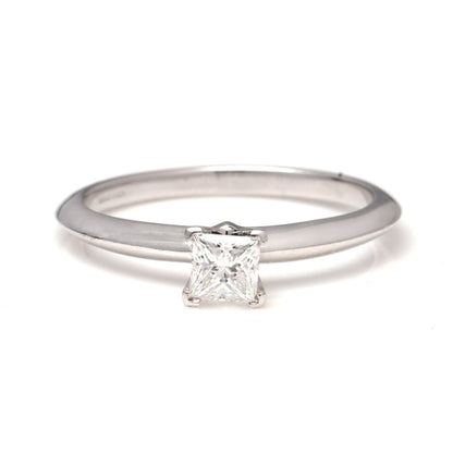 Tiffany and Co Princess Cut Diamond Solitaire Engagement Ring; platinum engagement ring set with 0.39ct square-cut diamond. Comes with original box and certificate