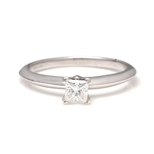 Tiffany and Co Princess Cut Diamond Solitaire Engagement Ring; platinum engagement ring set with 0.39ct square-cut diamond. Comes with original box and certificate