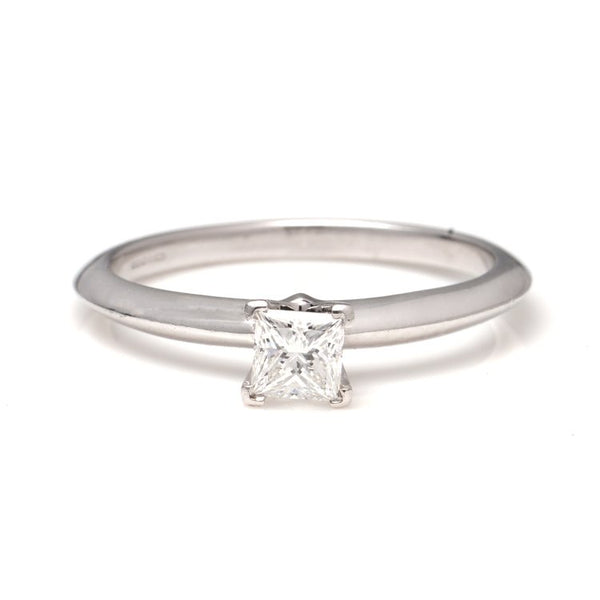 Tiffany and Co Princess Cut Diamond Solitaire Engagement Ring; platinum engagement ring set with 0.39ct square-cut diamond. Comes with original box and certificate