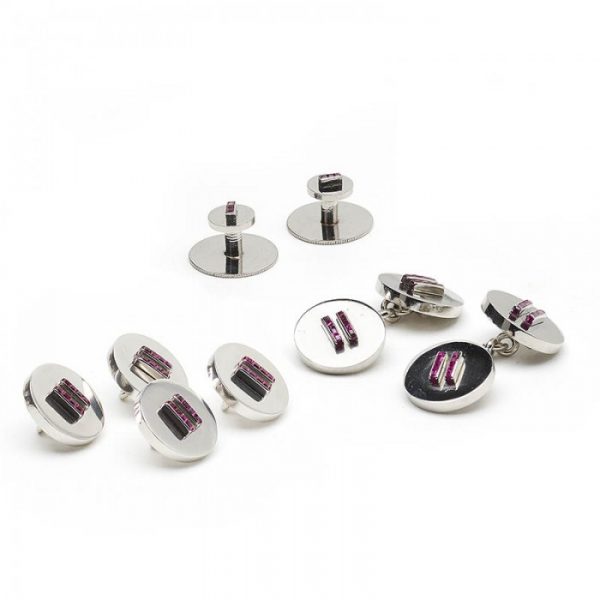 Cartier Vintage Ruby and Platinum Dress Set; comprising a pair of cufflinks, four buttons and two studs, in original fitted case, Signed and numbered, Circa 1950
