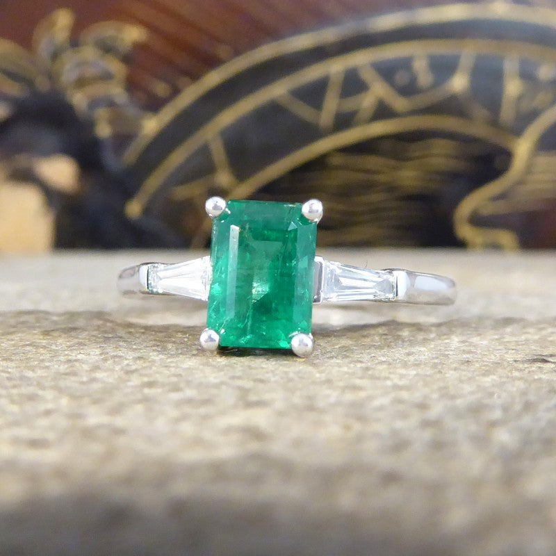 1.03ct Emerald Ring with Tapered Baguette Cut Diamond Shoulders