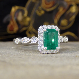 1.05ct Emerald and Diamond Cluster Ring with Diamond Set Shoulders
