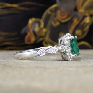 1.05ct Emerald and Diamond Cluster Ring with Diamond Set Shoulders