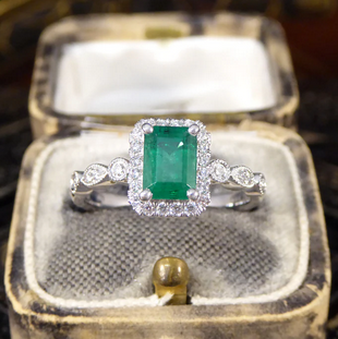 1.05ct Emerald and Diamond Cluster Ring with Diamond Set Shoulders