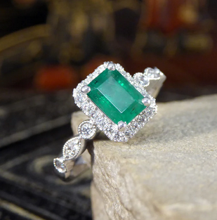1.05ct Emerald and Diamond Cluster Ring with Diamond Set Shoulders