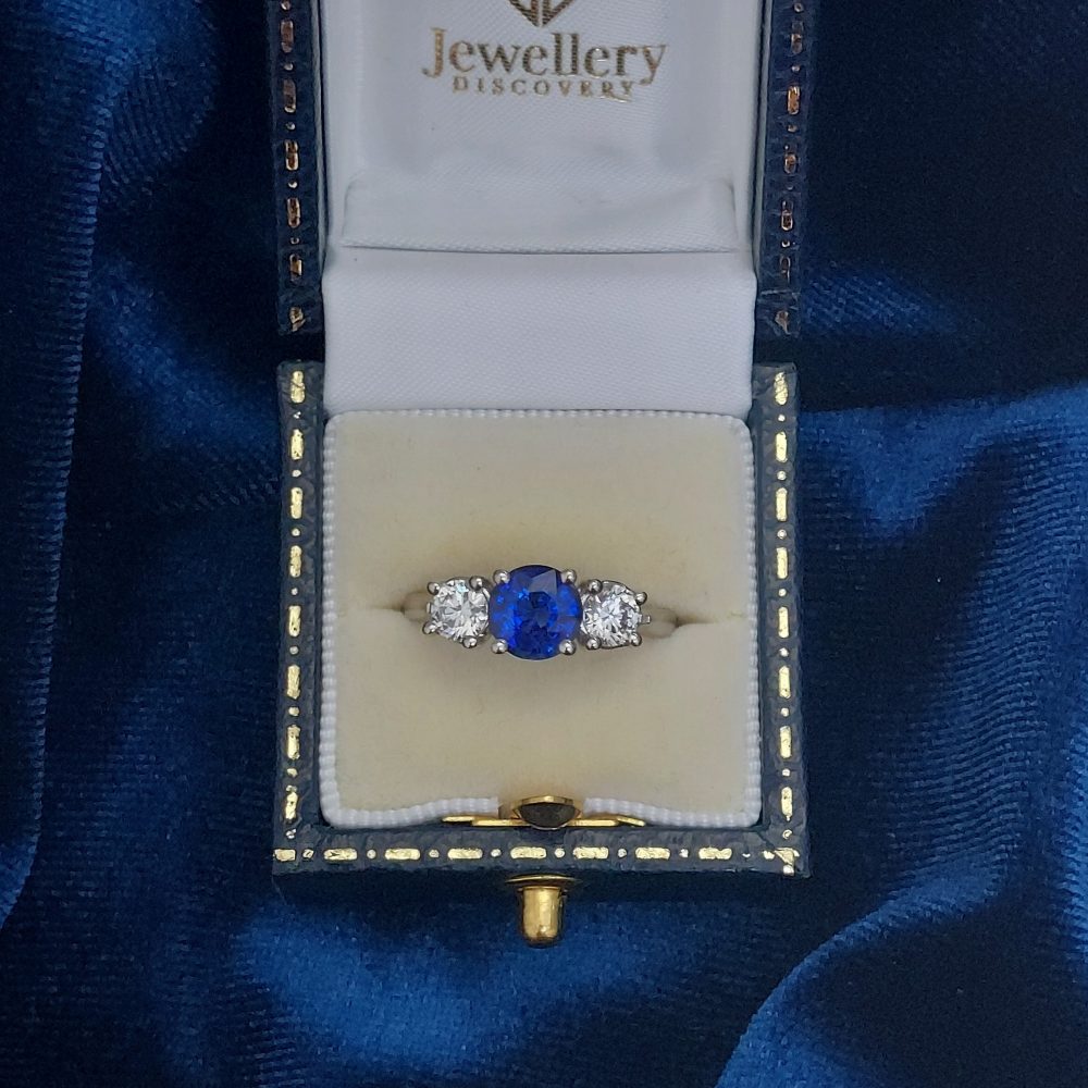 1.10ct Sapphire and 0.60ct Diamond Three Stone Ring