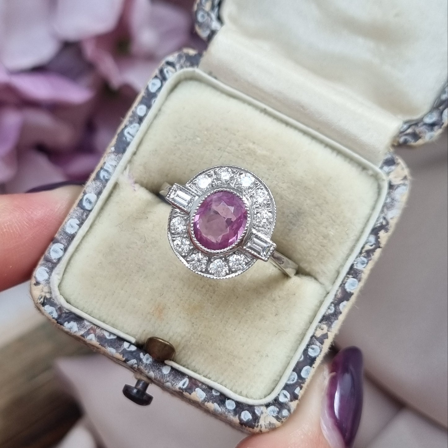 1.20ct oval pink sapphire ring with diamonds in platinum