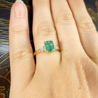 1.26ct Emerald Ring with Baguette Cut Diamond Shoulders