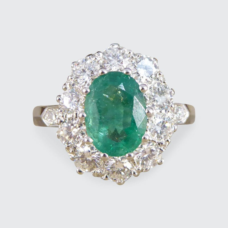 1.30ct Emerald and Diamond Cluster Ring in Platinum