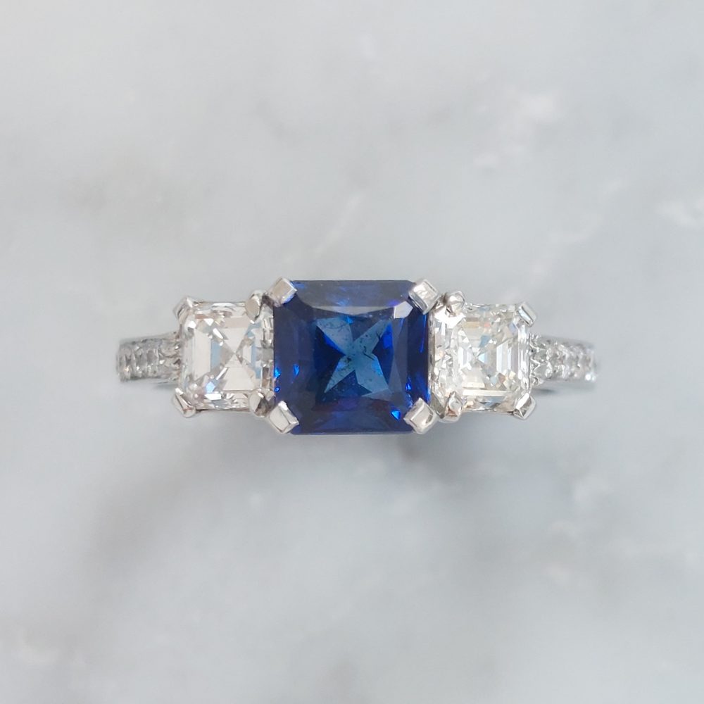 1.45ct Sapphire and Asscher Cut Diamond Three Stone Ring