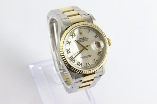 Rolex Oyster Perpetual Datejust 16233 Steel and Gold 36mm Automatic Watch with Original Mother of Pearl Dial, yellow gold fixed bezel, Roman numerals, date indicator, screwdown crown and sapphire crystal, steel and gold Oyster bracelet with fold-over clasp, with Rolex box and papers