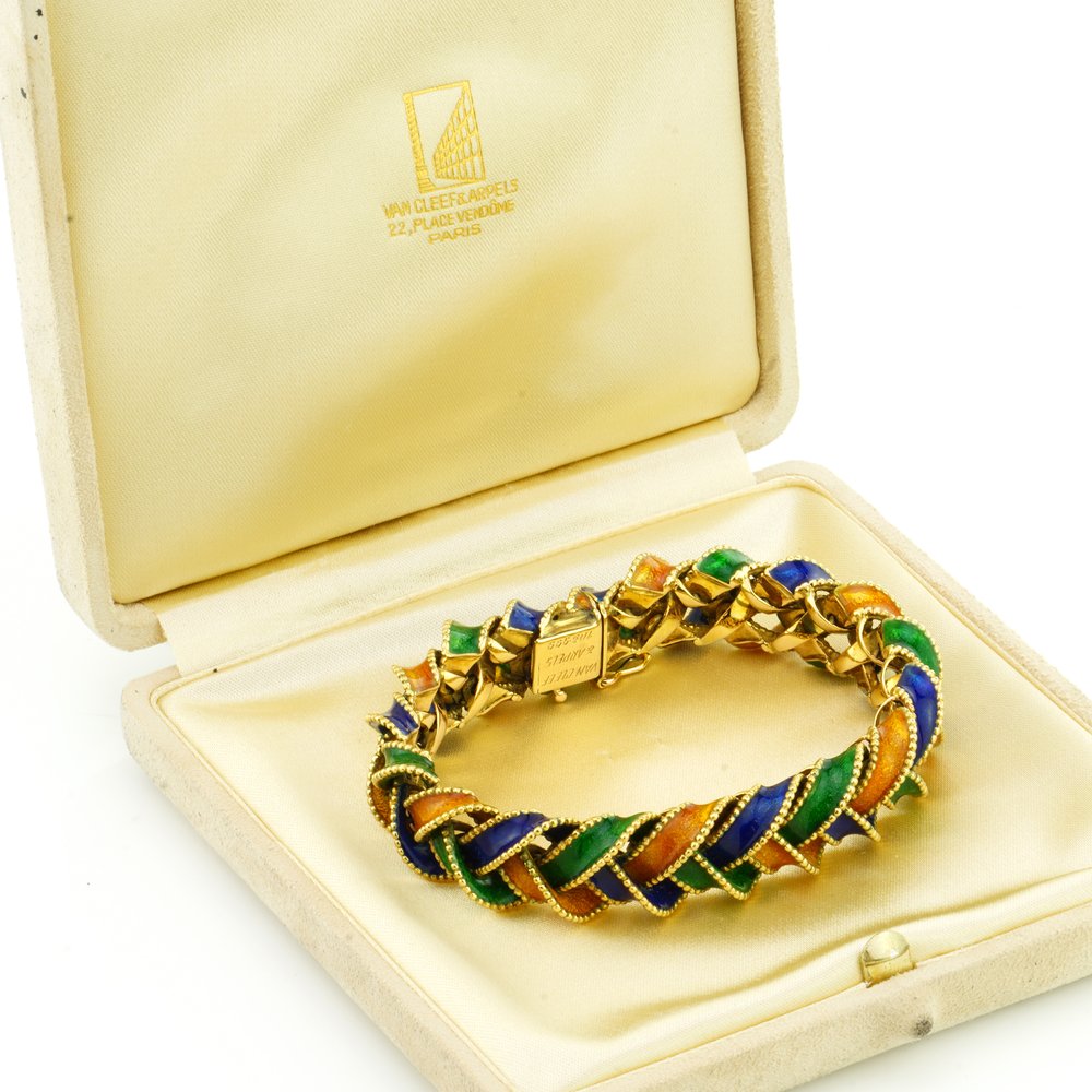 Vintage Van Cleef and Arpels 18ct Gold and Enamel Plait Bracelet; a plaited 18ct yellow gold bracelet decorated with orange, green and blue enamel, Signed and Numbered, in original box, Circa 1960s