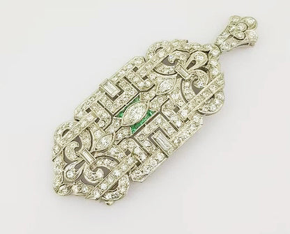 Antique Diamond and Emerald set Brooch Pendant; set with marquise and brilliant cut diamonds, central emerald border, geometric design, 18ct white gold