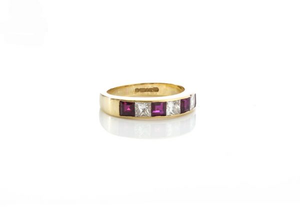 Garrard Princess Cut Ruby and Diamond Half Eternity Ring, 0.64ct princess-cut rubies and 0.48cts princess-cut diamonds, in 18ct Yellow Gold