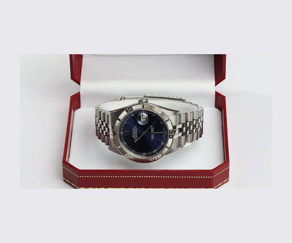 Rolex Datejust Turn-O-Graph 16264 Stainless Steel Watch; 36 mm case, blue dial, magnified date, automatic movement, Jubilee bracelet