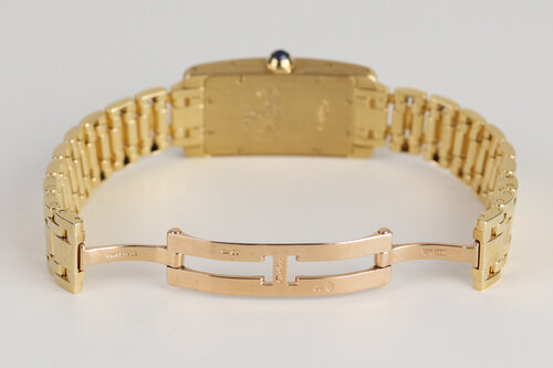 Cartier Tank Américaine Ladies 18ct Yellow Gold Quartz Watch, Ref 1710, white dial, Roman numerals, sapphire crystal, 18ct yellow gold bracelet with double-fold clasp, with Cartier box.