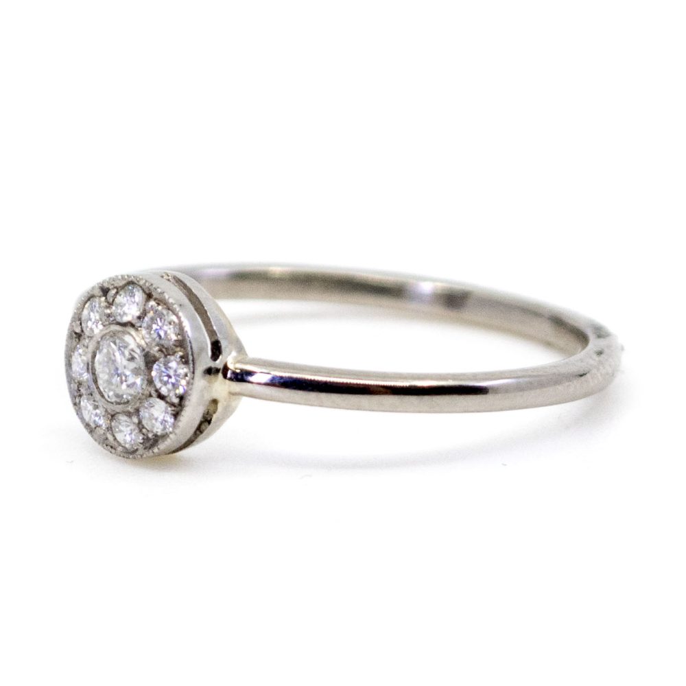 Vintage diamond cluster ring in white gold.