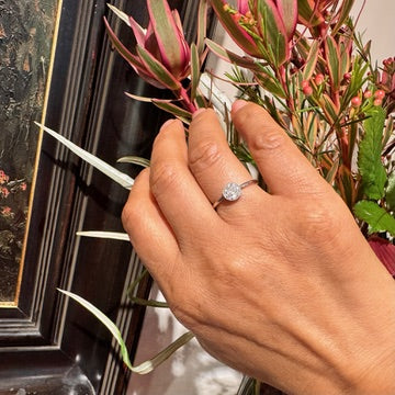 Vintage diamond cluster ring in white gold.