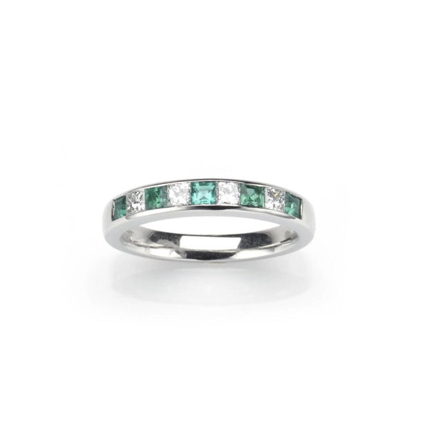 Emerald and diamond half eternity ring