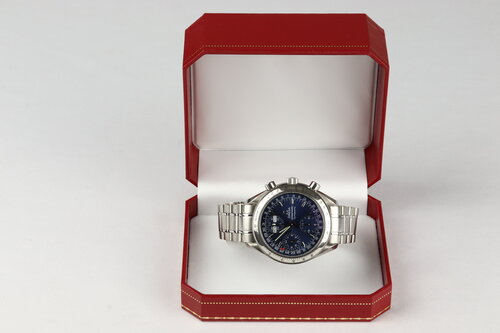 Omega Speedmaster Day Date 38mm Automatic Chronograph Stainless Steel Watch, blue dial with weekday, month and date indicators, steel bracelet strap