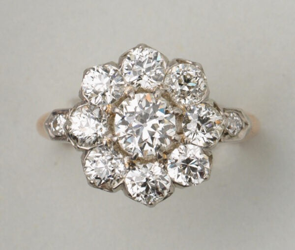 Antique Edwardian Old Cut Diamond Floral Cluster Ring; 18ct yellow gold and platinum cluster ring set with old-cut diamonds, 2.75 carats, France, Circa 1910