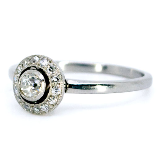 A diamond halo cluster ring in platinum