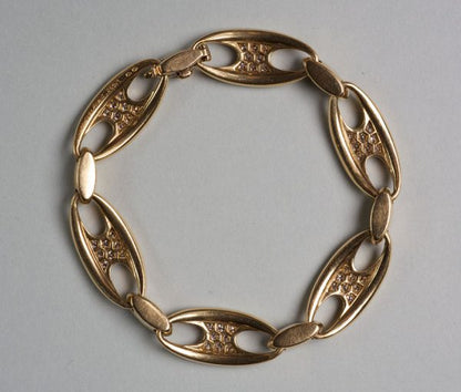 Vintage Mauboussin Diamond and 18ct Gold Bracelet; set with 2cts brilliant-cut diamonds. Signed and numbered: 26913, maker’s mark ‘Ste E’, Circa 1965.