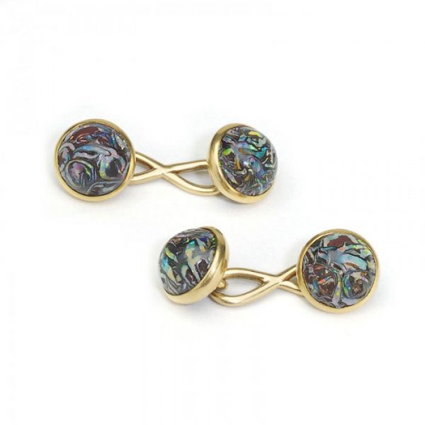 Antique Tiffany and Co Boulder Opal and Gold Cufflinks; cabochon boulder opal mounted in gold, with figure-of-eight links. Circa 1910, Signed