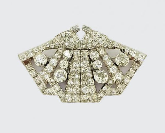 6.50ct Diamond Double Clip Butterfly Brooch; crafted from platinum, In the form of a geometric butterfly. Total diamond weight: 6.50 carats
