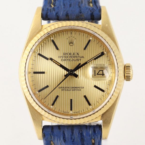 Vintage Rolex Datejust 16018 18ct Yellow Gold Watch with Tapestry Dial, quick-set date, screwdown crown and sapphire glass, automatic movement, on a blue leather strap with Rolex pin buckle, with a Rolex box, Circa 1987