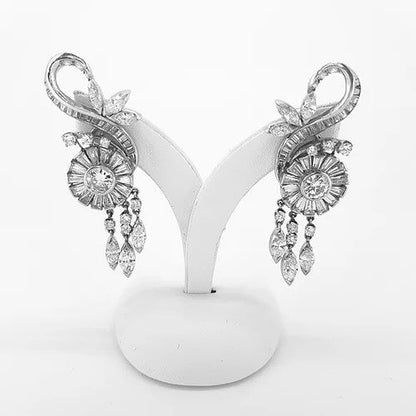 Vintage 1950s Baguette Cut Diamond Platinum Floral Spray Earrings, 6.00 carat total, baguette-cut and round-brilliant cut diamonds in a central floral cluster and surrounding spray and drops. Mounted in platinum