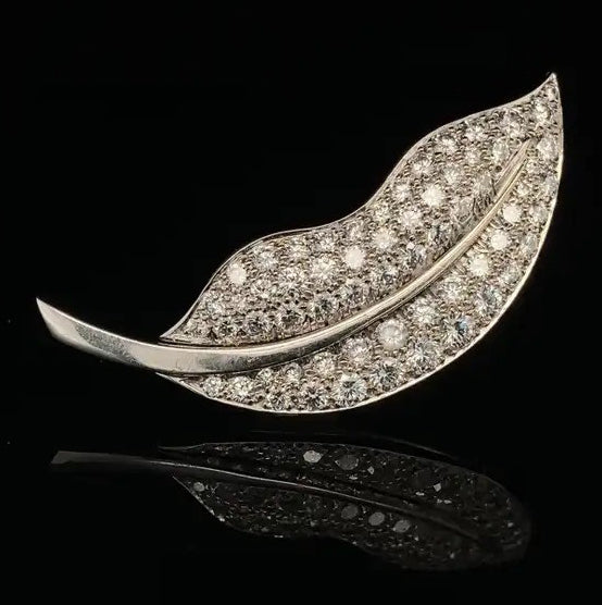 Vintage Van Cleef and Arpels 3ct Diamond Leaf Brooch, set with 3.10 carats of brilliant-cut diamonds in 18ct white gold Signed and Numbered Circa 1950s