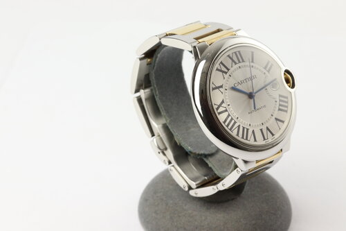 Cartier Ballon Bleu 42mm Steel and Gold Automatic With Papers, Ref. 3001, silver guilloche dial, black Roman numerals, date indicator, cabochon crown, sapphire crystal, steel and gold bracelet with push-button folding clasp, with Cartier papers.