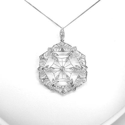 Geometric Snowflake Diamond Pendant in Platinum; in the form of an openwork snowflake and set with brilliant-cut diamonds