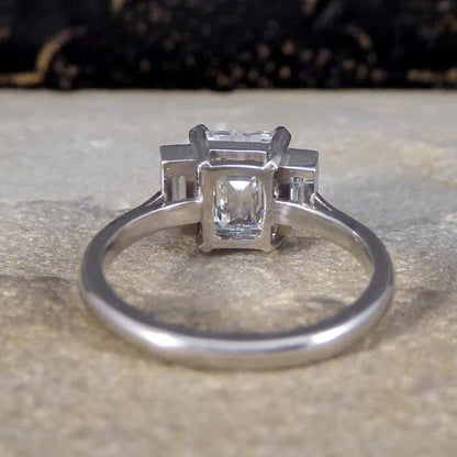 2.57ct Emerald and Baguette Cut Diamond Three Stone Engagement Ring in Platinum