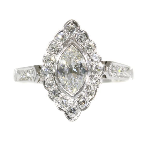 Vintage 1950s Marquise Diamond Cluster Ring; featuring a central 0.45ct marquise cut diamond surrounded by 0.40cts single cut diamonds, 0.85 carat total, mounted in platinum