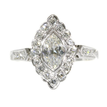 Vintage 1950s Marquise Diamond Cluster Ring; featuring a central 0.45ct marquise cut diamond surrounded by 0.40cts single cut diamonds, 0.85 carat total, mounted in platinum