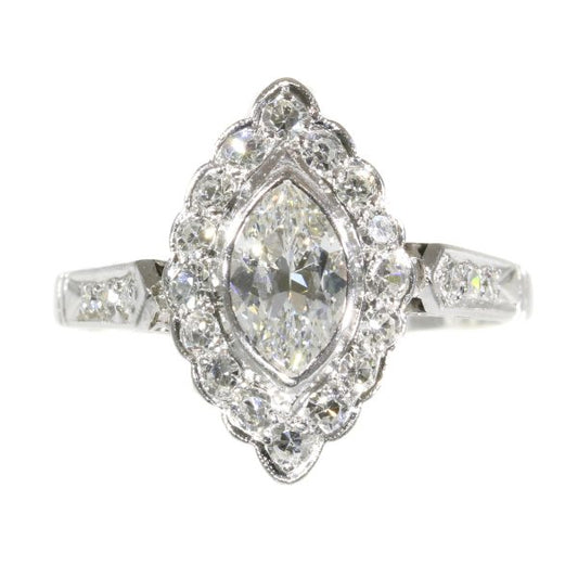 Vintage 1950s Marquise Diamond Cluster Ring; featuring a central 0.45ct marquise cut diamond surrounded by 0.40cts single cut diamonds, 0.85 carat total, mounted in platinum