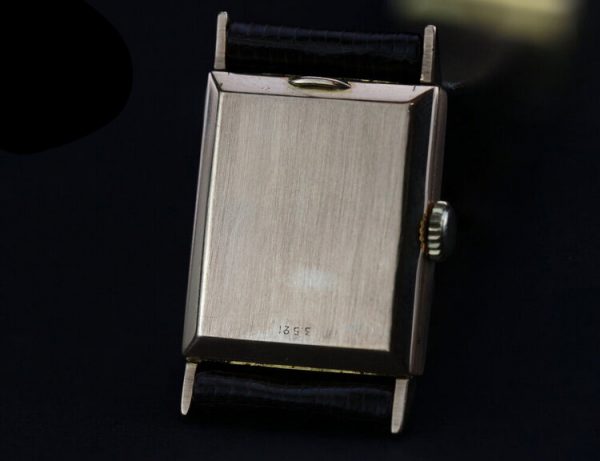 Boucheron Vintage 18ct Yellow Gold Manual 20mm Watch with Omega Movement ref 9837468, golden face, leather strap, Circa 1960s