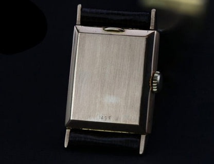 Boucheron Vintage 18ct Yellow Gold Manual 20mm Watch with Omega Movement ref 9837468, golden face, leather strap, Circa 1960s