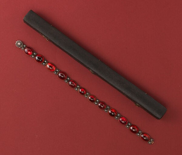 Antique Georgian Garnet and Diamond Collier de Chein Collar Necklace; set with twelve large oval rose cut garnets, with old-cut diamonds, in silver and gold