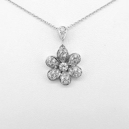 Diamond Daisy Flower Cluster Pendant; set with 0.85 carats of round brilliant cut diamonds, in 18ct white gold