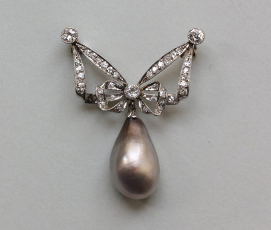 Antique Edwardian Old Cut Diamond, Natural Pearl and Platinum Bow Brooch; set with 39 single and old-cut diamonds, 12ct natural grey pearl drop, certified