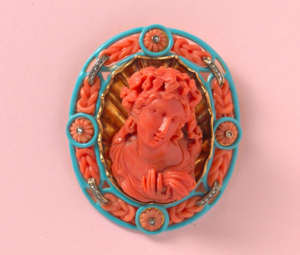 18th Century Carved Coral Cameo Brooch of Bacchante, a follower of Bacchus, framed by carved coral knots, rose-cut diamond ribbons and carved coral flowers